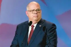  ?? JOHN LOCHER/AP ?? Gov. Larry Hogan speaks at an annual leadership meeting of the Republican Jewish Coalition on Nov. 18 in Las Vegas. — A two-minute ad called “Exhausted Majority” that An America United released the same day Democratic President Joe Biden held an election eve rally in Maryland.