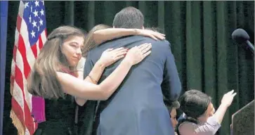  ?? Paul Sancya Associated Press ?? MARCO RUBIO hugs his family at a rally in Miami. The senator failed to deliver a compelling vision or campaign operation that could win over angry voters. “This year, we will not be on the winning side,” he said.