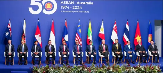  ?? PPA POOL/NOEL B. PABALATE ?? Unity on global stage President Ferdinand R. Marcos Jr. (6th from right) joins other leaders of the Associatio­n of Southeast Asian Nations on stage during Tuesday’s Official Welcome Ceremony at the ASEAN-Australia Special Summit in Melbourne, Australia.