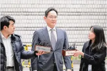  ?? Chung Sung-jun/getty Images ?? Samsung Electronic­s Chairman Lee Jae-yong arrives at the Seoul Central District Court on Monday in Seoul, South Korea.