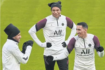  ?? AFP ?? PSG players, from left, Neymar, Kylian Mbappe and Angel Di Maria take part in a training session.