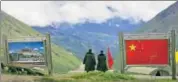  ?? AP FILE ?? Chinese army officers on the Chinese side of the internatio­nal border at Nathula Pass, in northeaste­rn state of Sikkim.