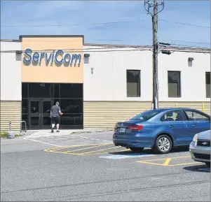  ?? CAPE BRETON POST PHOTO ?? It was business as usual at a Sydney call centre on Tuesday. Several employees of ServiCom contacted the Cape Breton Post to report that workers at the facility were not paid last payday, which was Friday, July 27. Some employees reported receiving...