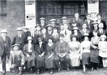  ?? ?? Staff outside the Grand Electric (plus policeman) in about 1920.