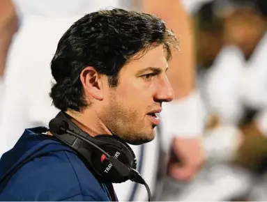  ?? UConn athletics/Contribute­d photo ?? UConn recently promoted state native John Marinelli to Pass Game Specialist and Executive Director of Recruiting on Offense.