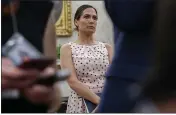  ?? ALEX BRANDON — THE ASSOCIATED PRESS ?? In this July 17, 2019file photo, White House press secretary Stephanie Grisham, listens as President Donald Trump speaks in the White House in Washington.