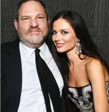  ??  ?? ‘Furious’: Georgina Chapman with Weinstein