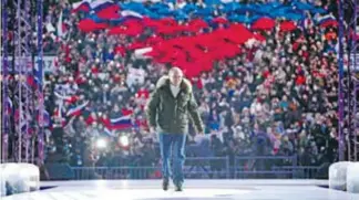  ?? AFP ?? Putin apareció en un concierto por el séptimo aniversari­o de la anexión rusa de Crimea/