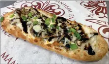  ?? PHOTO COURTESY OF PA REN FAIRE ?? Shiitake mushrooms, scallions, brie and a balsamic glaze top this Mystical Mushroom Pizza, a weekly special.