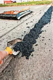  ??  ?? Once the asphalt material is installed, compacted and cooled, the lightweigh­t oils in the asphalt cement need to evaporate.