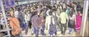  ?? PTI ?? ■ Passengers at a platform at Santragach­i Station where stampede took place in Howrah district of West Bengal on Tuesday.