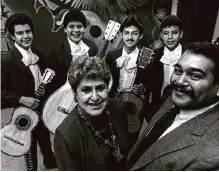  ?? Rodolfo Gonzalez/staff file photo ?? Belle and Juan Ortiz are shown with mariachi students. Lanier High has honored the teacher, who died in July at 90.