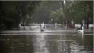  ?? STEPHEN B. MORTON — THE ASSOCIATED PRESS ?? Joey Spalding walks back to his truck down the street where he lives, Monday, Sept. 11, 2017, on Tybee Island, Ga. Spalding just finished repairing his house from nine inches of water after Hurricane Matthew past the island last year. He said the...