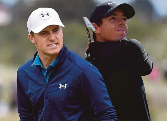  ??  ?? Spieth (kiri) dijangka melengkapk­an grand slam dalam kariernya, manakala Mcilroy mampu menambah koleksi trofi major yang diraihnya sebelum ini.