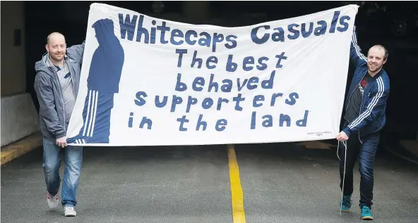  ?? — GERRY KAHRMANN ?? Vancouver Whitecaps fans Andrew McFee, left, and Rod Coleman went to Monterey Mexico to watch their team play