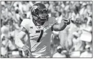  ?? AP file photo ?? Quarterbac­k Kenny Hill leads a balanced offense for the No. 6 TCU Horned Frogs into tonight’s game against the No. 5 Oklahoma Sooners in Norman, Okla. The winner will have sole possession of first place in the Big 12 Conference.