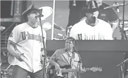  ?? MIKE RYNEARSON/THE REPUBLIC ?? Country star Trace Adkins performs on the infield of Chase Field during a concert following a Diamondbac­ks game in 2008 in downtown Phoenix.