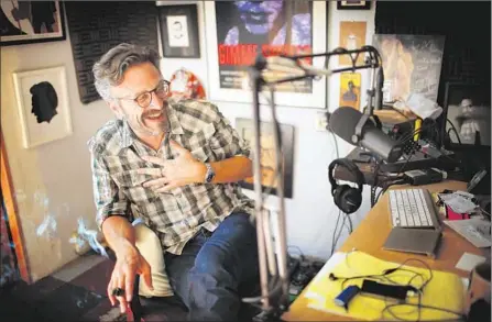  ?? Barbara Davidson
Los Angeles Times ?? “I WANTED
to have a real conversati­on” rather than a political discussion, podcaster Marc Maron says in his Highland Park garage.