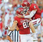  ?? [PHOTO BY BRYAN TERRY, THE OKLAHOMAN] ?? Oklahoma’s Mark Andrews (81) and Baker Mayfield (6) were both named to the Pro Football Focus All-American first team on Wednesday.