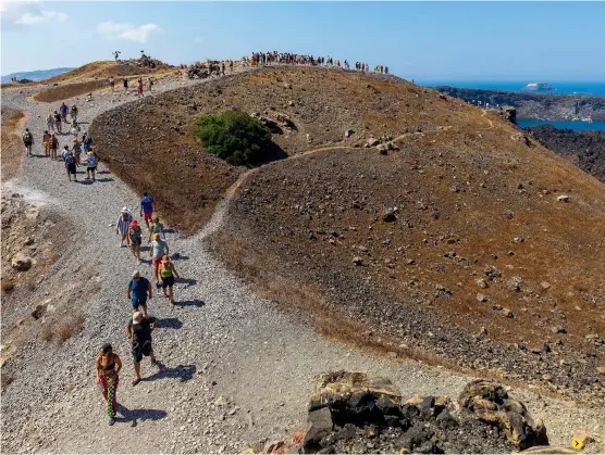  ?? ?? Below: Nea Kameni Volcanic Park, Santorini