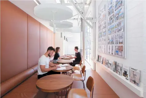  ??  ?? Above — The studio's kitchen and canteen provides a quiet spot for staff to meet and relax.