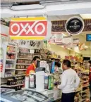  ??  ?? FORTALEZA. Femsa se vio favorecida por las fuertes ventas de Oxxo.