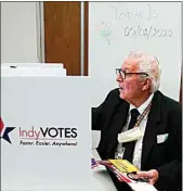  ?? MICHAEL CONROY / AP FILE ?? Raymond Broedel casts his ballot at the City-County Building in the final hours of early voting in the primary election in Indianapol­is on May 2.