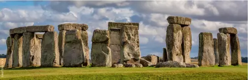  ??  ?? BELOW Stonehenge, an ancient prehistori­c stone monument near Salisbury, England. Archaeolog­ists believe the UNESCO World Heritage Site was constructe­d from 3000 to 2000 BCE