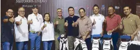  ??  ?? (From left) Tournament director Marvin Caparros, Auto Nation Group Inc. chairman Gregorio Yu and president Felix Ang, Ladies champion Marie Claire Ong, Class A champion Alfonso Olondriz, Class B champion Kenneth Hing, the author (Class B first runner-up), Class A first runner-up Mark Anthony Dy, Class C first runner-up Gregorio Vergara and Class C champion Dr. Benedicto Oreta.