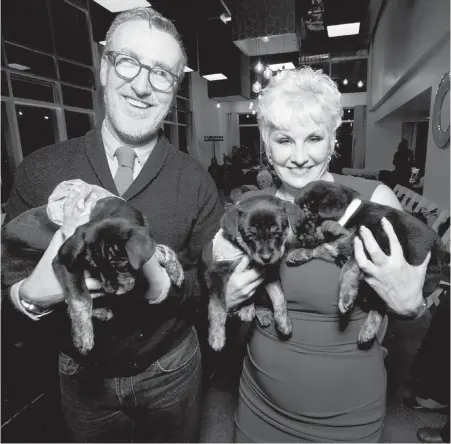  ??  ?? Outlooks for Men owner Dale Olsen and Victoria Humane Society executive director Penny Stone at the 2015 Man and His Dog show.