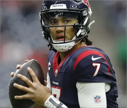  ?? MATT PATTERSON — THE ASSOCIATED PRESS ?? Rookie quarterbac­k C.J. Stroud threw three touchdown passes in the Texans' 45-14victory over the Browns in an AFC wild-card game Saturday.