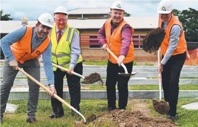  ?? ?? Ausco Modular regional manager North Queensland Bradley Hunt, Cairns and Hinterland Hospital and Health Service chairman Dr Clive Skarott, Member for Mulgrave Curtis Pitt and Bentley Park College Principal Bruce Houghton. Picture: Isaac McCarthy