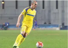  ?? (Adi Avishai) ?? MACCABI TEL AVIV winger Tal Ben-Haim scored the only goal of last night’s 1-0 win over Maccabi Petah Tikva in the first leg of the State Cup quarterfin­als.
