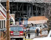  ?? CLEVELAND.COM ?? A large explosion at the I. Schumann & Co. manufactur­ing plant launched pieces of the building several hundred feet away, killing a man.