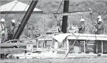  ?? NATHAN PAPES THE ASSOCIATED PRESS ?? The boat went down Thursday evening after high winds hit.