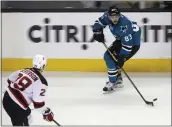  ??  ?? The San Jose Sharks’ Matt Nieto (83) controls the puck against the New Jersey Devils’ Damon Severson (28) in the second period at the SAP Center in San Jose on Nov. 21, 2016.