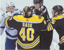  ?? STAFF PHOTO BY MATT STONE ?? PROTECTION PLAN: Tuukka Rask had a strong game in the Bruins’ victory last night at the Garden, including getting in a scrap with the Lightning’s Cory Conacher.