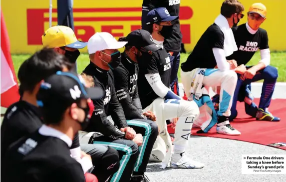  ?? Peter Fox/Getty Images ?? Formula One drivers taking a knee before Sunday’s grand prix