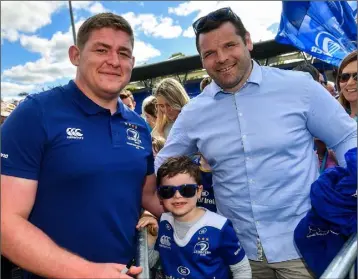  ??  ?? Tadhg Furlong at the homecoming in Donnybrook on Sunday with his former Leinster colleague Mike Ross, who was accompanie­d by his son, Kevin.