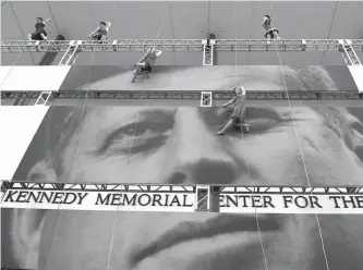  ?? AFP-Yonhap ?? Dancers from the Bandaloop performanc­e group dance on a picture of John F. Kennedy at Kennedy Center for the Performing Arts as part of the JFK Centennial celebratio­ns in Washington, D.C., May 26. Monday marked the 100-year anniversar­y of his birth.