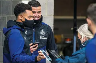  ?? ?? Vaccinated: Newcastle’s Karl Darlow and Jacob Murphy show Covid passes