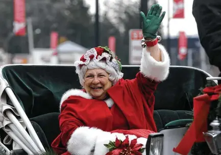  ?? Michael P. Farrell / Hearst file photo ?? Portrayals of Mrs. Claus since the 19th century have tended to emphasize her domestic role, and as a support player for her famous husband. But a closer look shows the character has evolved with society’s conception of gender roles.