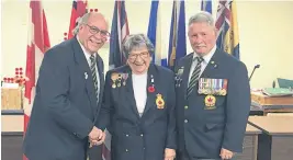  ?? CONTRIBUTE­D ?? Lenora Begin is presented with the first poppy of the Branch 49 Mahone Bay of the Royal Canadian Legion’s 2022 Poppy Campaign. Making the presentati­on are Legion president Michael Brown, left, and vice-president Gary Silliker.