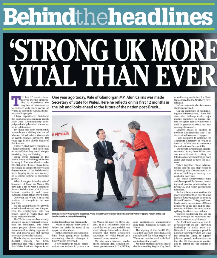  ??  ?? Welsh Secretary Alun Cairns welcomes Prime Minister Theresa May at the Conservati­ve Party Spring Forum at the SSE Swalec Stadium in Cardiff on Friday