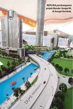  ??  ?? REPLIKA pembanguna­n projek Bandar Sungai KL
di Sungai Gombak.