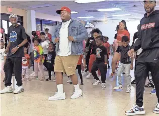  ?? RAY PADILLA / THE COMMERCIAL APPEAL ?? Memphis rapper Duke Deuce teaches a jookin’ dance class for kids at L.Y.E. Academy on Oct. 24.