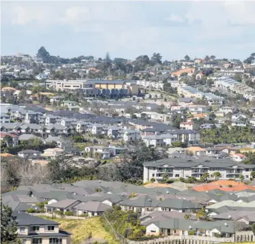  ??  ?? Some claim the ban has helped cool Auckland’s housing market. Photo / Michael Craig