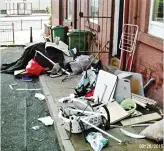  ??  ?? Doorstep delivery: Debris scattered outside terraced houses in Leeds