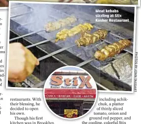  ??  ?? Meat kebabs sizzling at Stix Kosher Restaurant