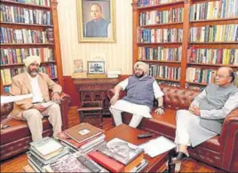  ??  ?? Chief minister Captain Amarinder Singh and finance minister Manpreet Badal meeting Union finance minister Arun Jaitley in New Delhi on Wednesday. HT PHOTO